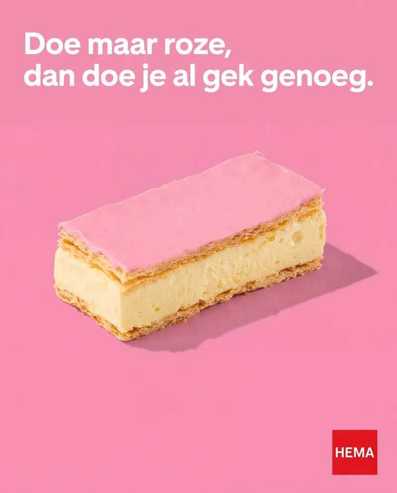 HEMA tompouce on a pink background with the line: Doe maar roze, dan doe je al gek genoeg.